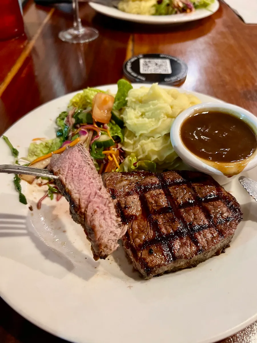 Medium cooked Prime Rib steak at Hog's Breath Cafe Cairns